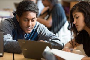 high school boy and girl at computer